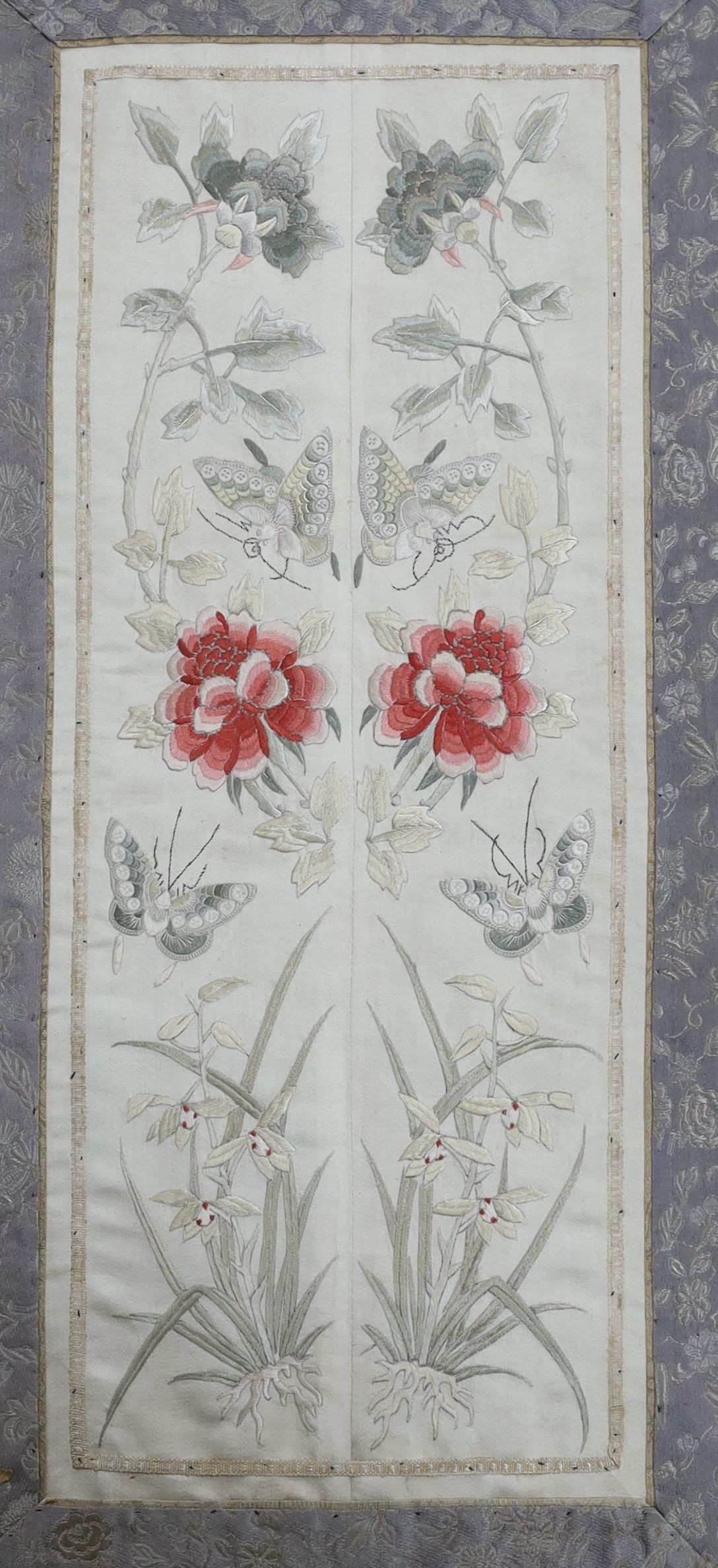 A pair of Chinese 19th century framed embroidered sleeve bands